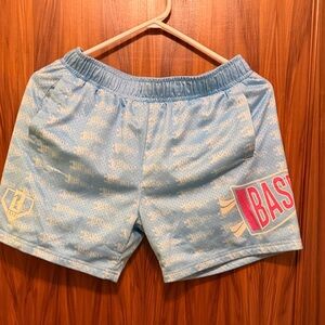 Baseball lifestyle boys size XL. Light Blue Athletic Shorts with Pink Accent